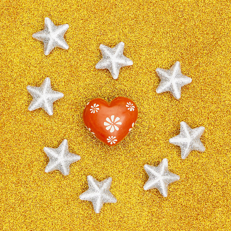 Cuore pietra saponaria arancione con fiore